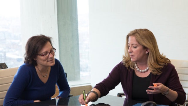 Jill Fopiano Working in Conference Room